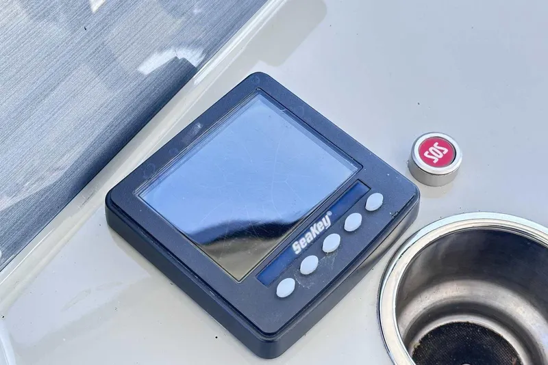 Slide: The Image of Control panel and SOS button on 2007 Formula 40 Performance Cruiser. - 19