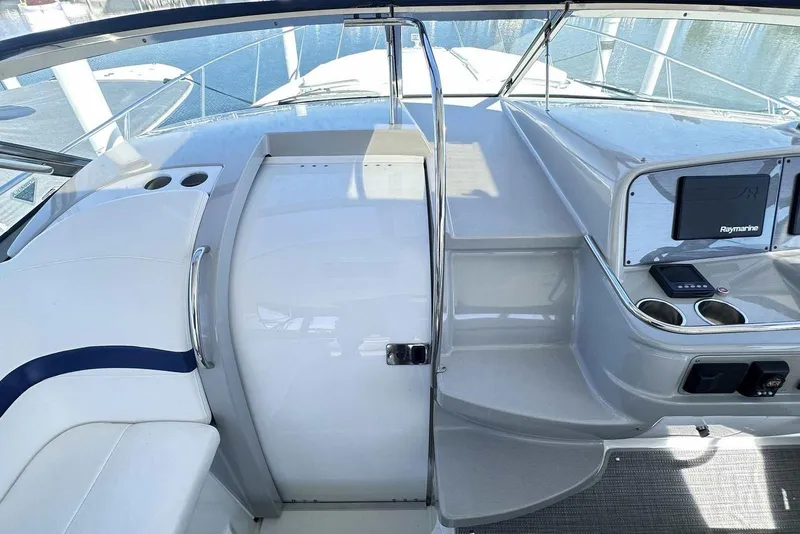 Slide: The Image of 2007 Formula 40 Performance Cruiser cockpit with seating, steps, and navigation equipment. - 21