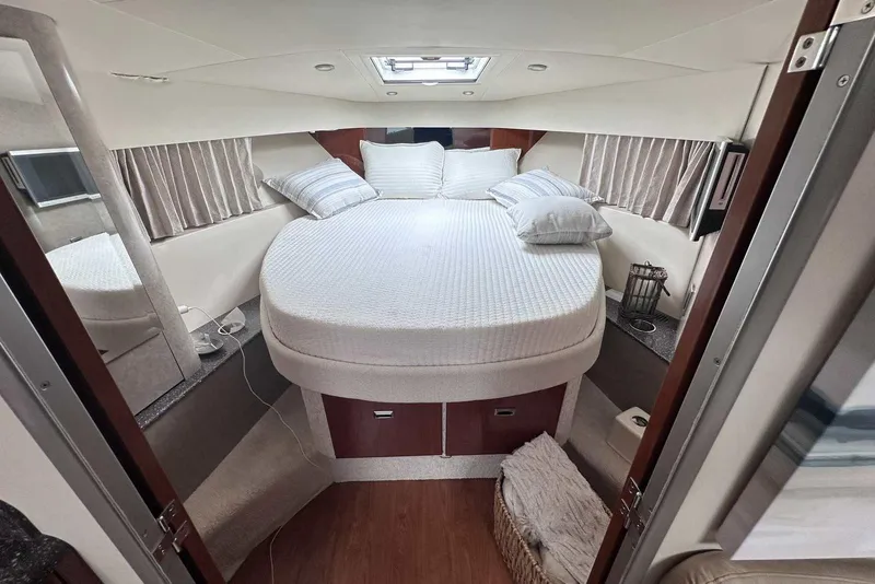 Slide: The Image of Luxurious cabin interior of 2007 Formula 40 Performance Cruiser with cozy bed and elegant decor. - 29