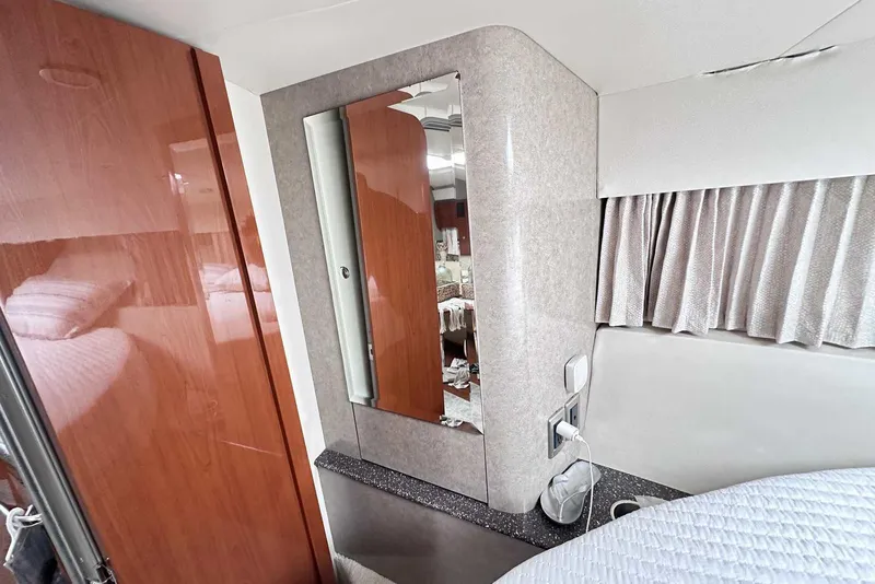 Slide: The Image of 2007 Formula 40 Performance Cruiser interior with wood paneling and mirror. - 32