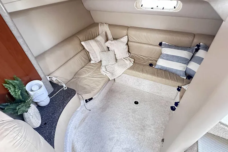 Slide: The Image of 2007 Formula 40 Performance Cruiser interior with beige seating and decorative pillows. - 35