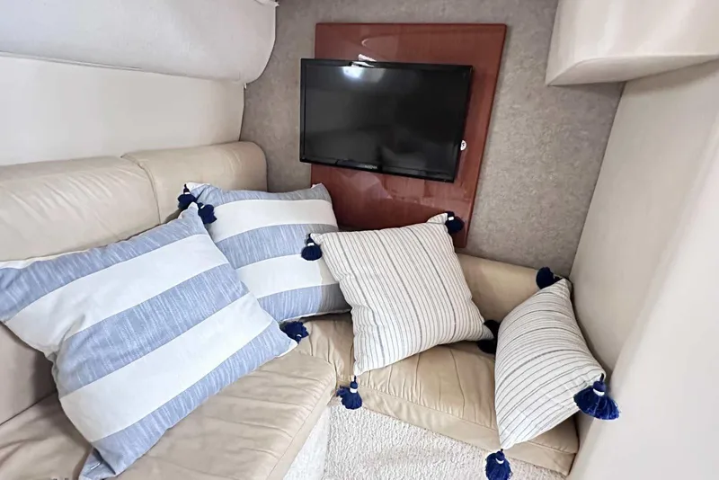 Slide: The Image of Interior of 2007 Formula 40 Performance Cruiser with cozy seating and decorative pillows. - 36