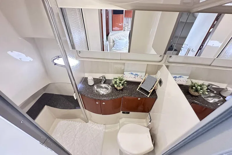 Slide: The Image of Luxurious bathroom in 2007 Formula 40 Performance Cruiser with modern amenities and elegant design. - 38