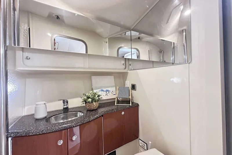 Slide: The Image of Luxurious bathroom interior of 2007 Formula 40 Performance Cruiser with modern fixtures and decor. - 40