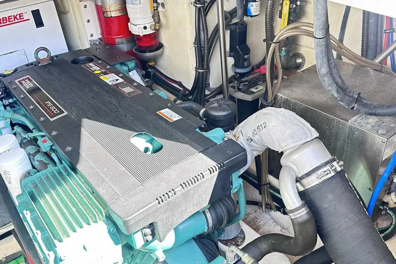 Slide: The Image of Engine compartment of a 2007 Formula 40 Performance Cruiser, showcasing detailed mechanical components. - 44