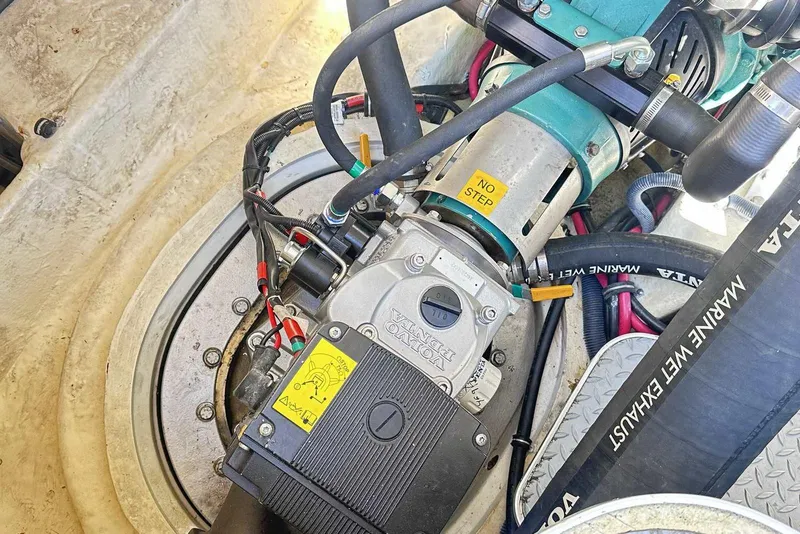 Slide: The Image of Engine compartment of a 2007 Formula 40 Performance Cruiser with visible components and hoses. - 46