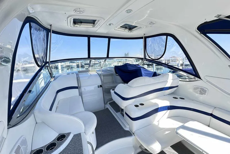 Slide: The Image of 2007 Formula 40 Performance Cruiser interior with white seating and panoramic windows. - 6