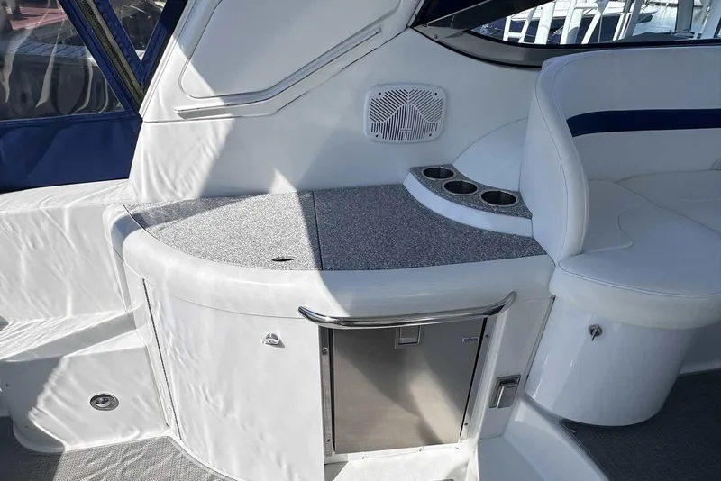 Slide: The Image of 2007 Formula 40 Performance Cruiser interior with seating, cup holders, and storage compartment. - 8