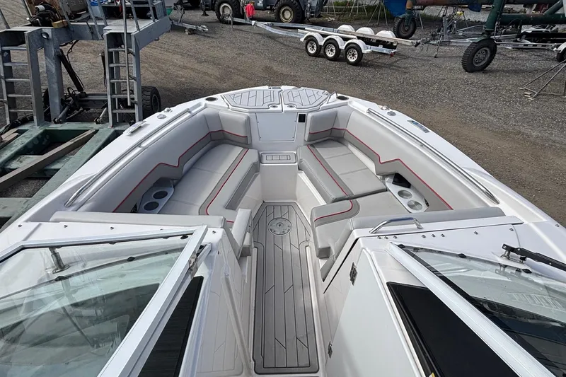Slide: The Image of 2024 Solara S-250 DC boat interior with sleek seating and modern design. - 12