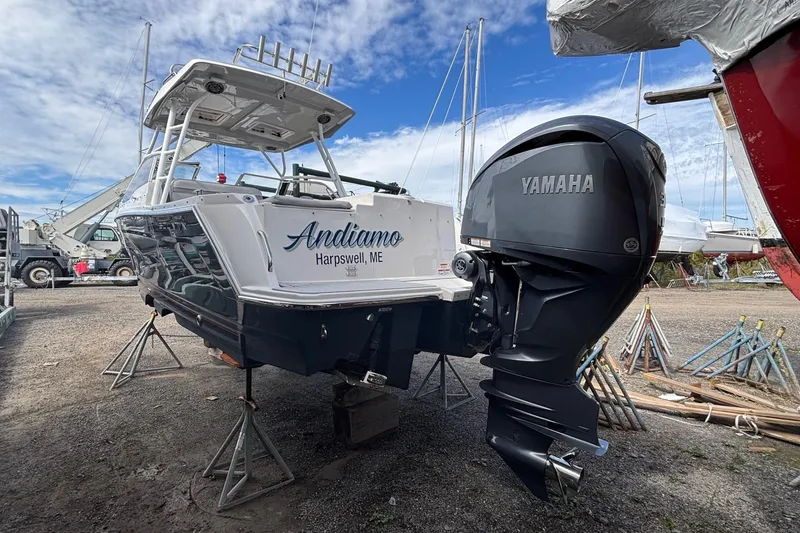 Slide: The Image of 2024 Solara S-250 DC boat with Yamaha engine, docked in Harpswell, ME. - 3