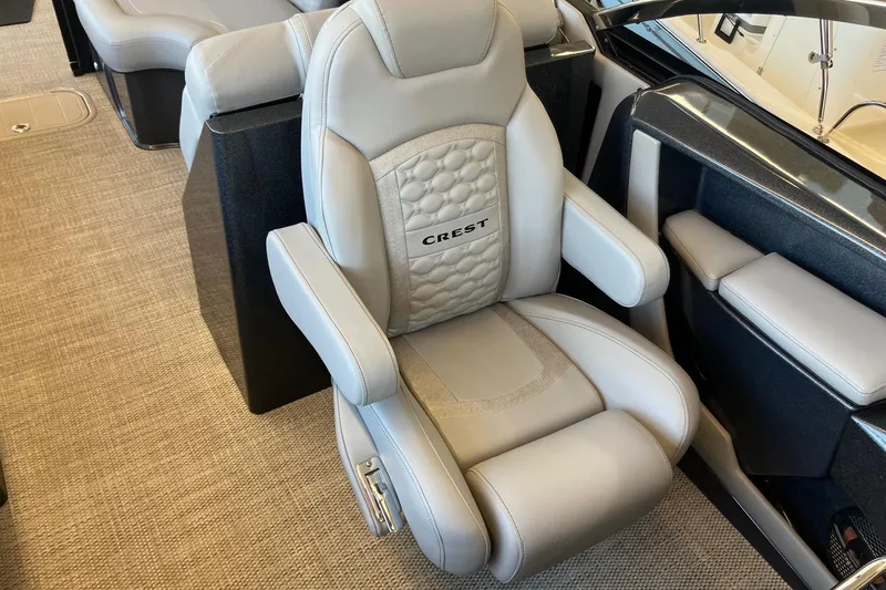 Slide: The Image of Luxurious seating in the 2026 Crest Continental 250 SLC boat interior. - 10
