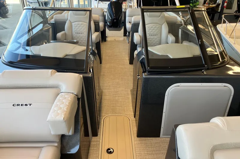 Slide: The Image of 2026 Crest Continental 250 SLC boat interior with luxurious seating and modern design. - 17