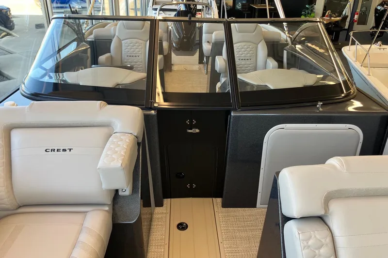 Slide: The Image of 2026 Crest Continental 250 SLC boat interior with luxurious seating and modern design. - 18