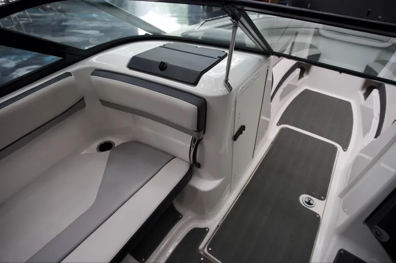 Slide: The Image of Interior of 2015 Yamaha Boats 212X, featuring sleek seating and modern design elements. - 12