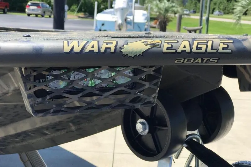 Slide: The Image of War Eagle Blackhawk 961 boat detail, showcasing logo and design, 2026 model. - 14
