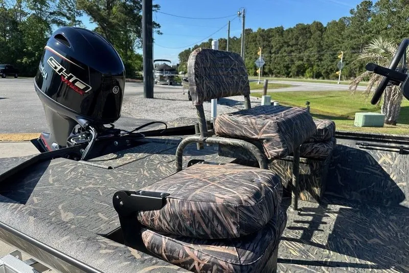 Slide: The Image of 2026 War Eagle Blackhawk 961 boat with camo seats and Yamaha SHO engine. - 5