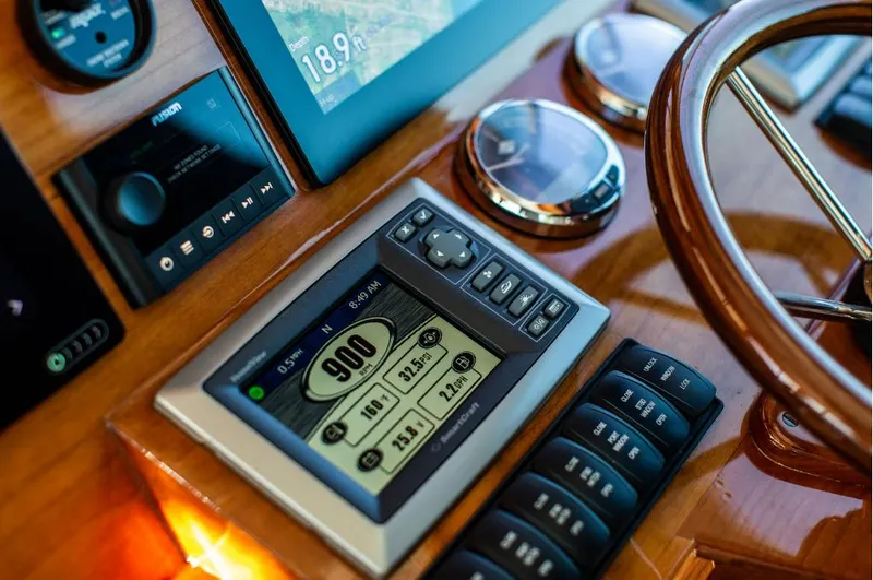 Slide: The Image of Control panel of 2013 Hinckley Talaria 48 MY yacht with digital display and gauges. - 18