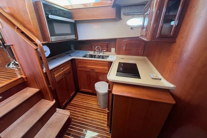 Slide: The Image of Luxurious wooden kitchen interior of 2013 Hinckley Talaria 48 MY yacht. - 23