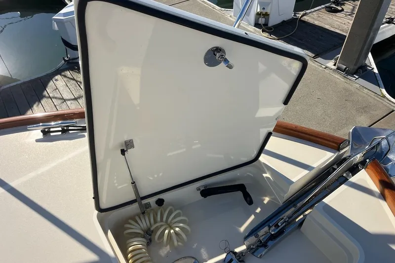 Slide: The Image of Open hatch on 2013 Hinckley Talaria 48 MY yacht, dockside view. - 34