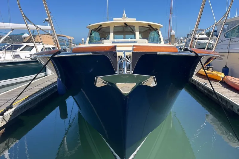 Slide: The Image of 2013 Hinckley Talaria 48 MY yacht docked in marina, front view. - 41