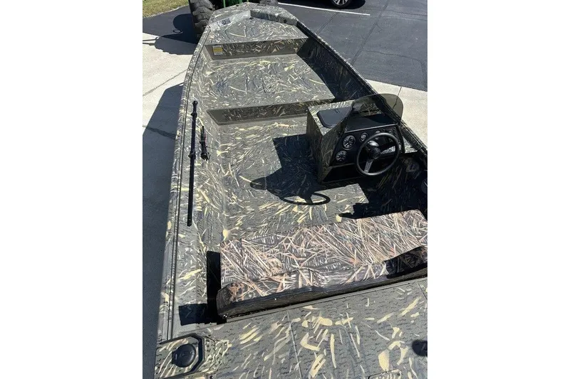 Slide: The Image of 2026 War Eagle 754LDSV boat with camouflage design and steering console. - 5