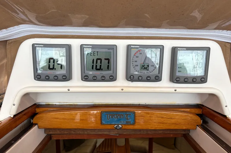 Slide: The Image of Control panel of a 2007 Tartan 3700 CCR sailboat with Raymarine instruments. - 18