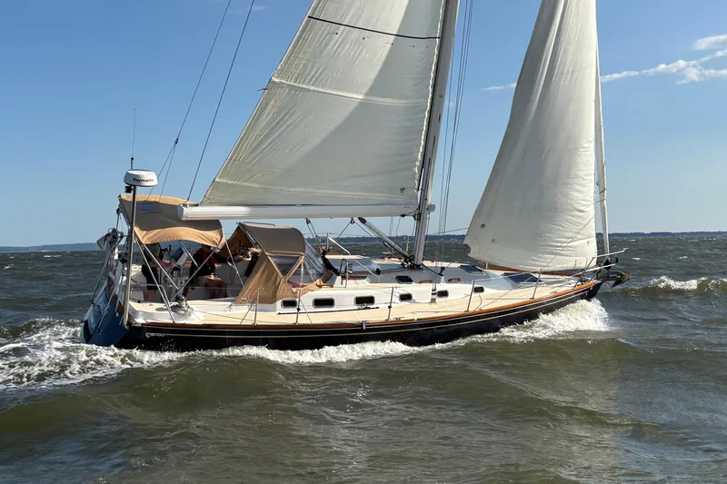 Slide: The Image of Sailing yacht Tartan 3700 CCR 2007 navigating choppy waters under clear skies. - 2