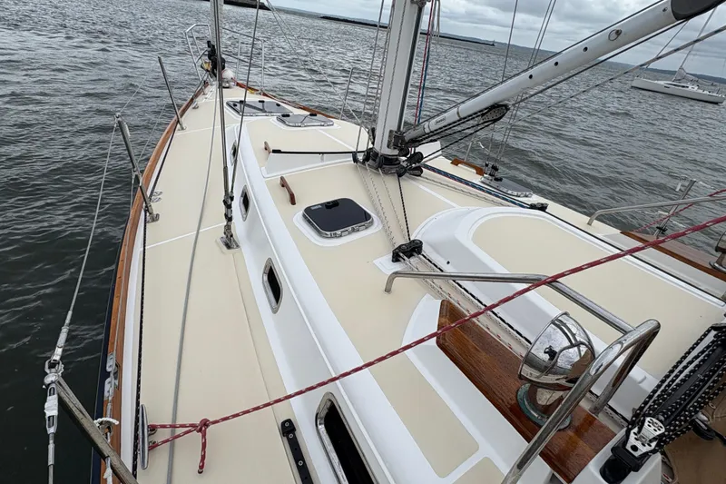 Slide: The Image of 2007 Tartan 3700 CCR sailboat deck view on calm waters. - 7
