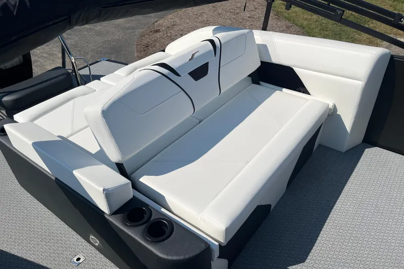 Slide: The Image of Luxurious white seating on 2026 Evotti 725CS boat, featuring cup holders and modern design. - 15