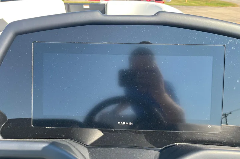 Slide: The Image of Dashboard of 2026 Evotti 725CS featuring a Garmin display screen. - 18