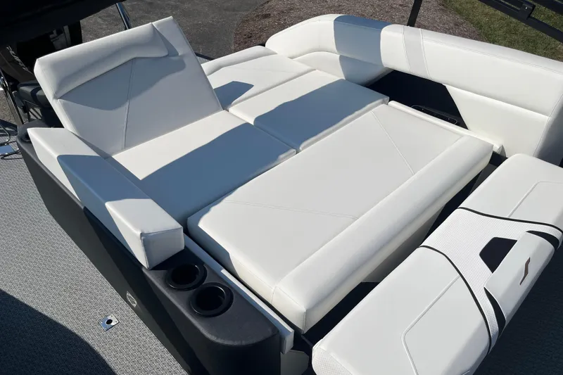 Slide: The Image of Luxurious white seating on 2026 Evotti 725CS boat, featuring cup holders and modern design. - 22