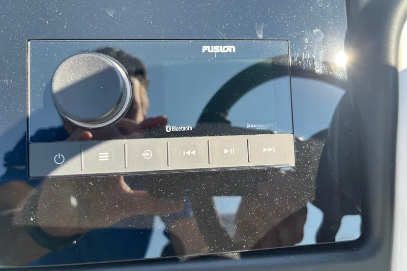 Slide: The Image of Evotti 725CS 2026 dashboard with Fusion audio system and Bluetooth connectivity. - 23