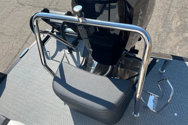 Slide: The Image of Rear view of 2026 Evotti 725CS boat with sleek chrome railing and cushioned seat. - 25