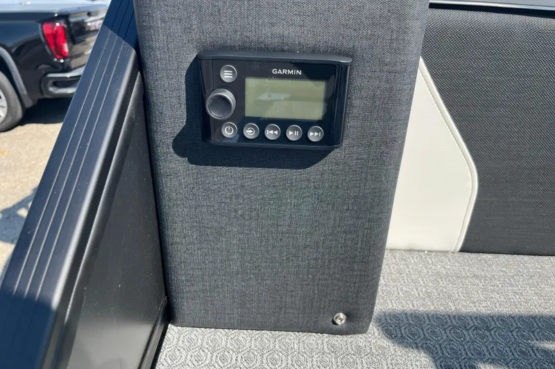 Slide: The Image of Garmin device on Evotti 725CS boat, 2026 model, with textured interior panel. - 26