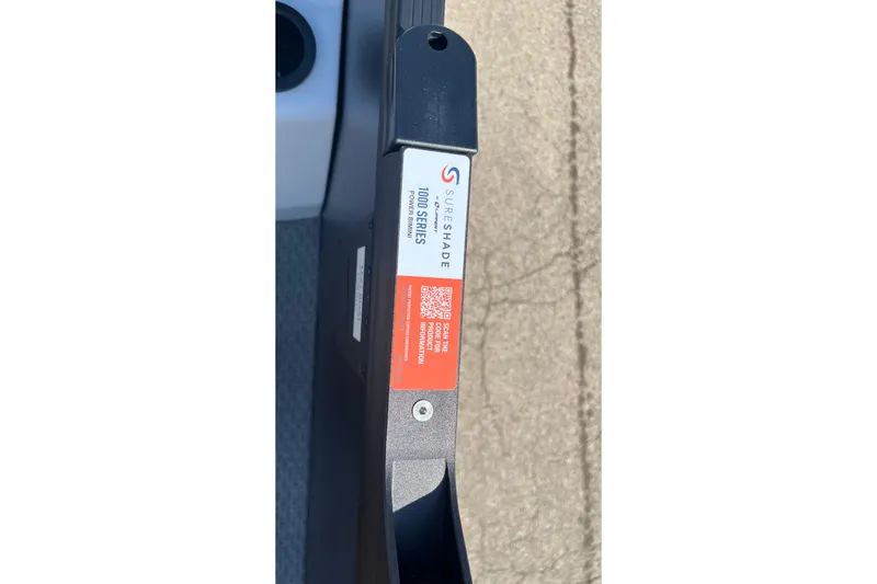 Slide: The Image of Evotti 725CS 2026 SureShade 1000 Series Power Bimini label on boat component. - 29