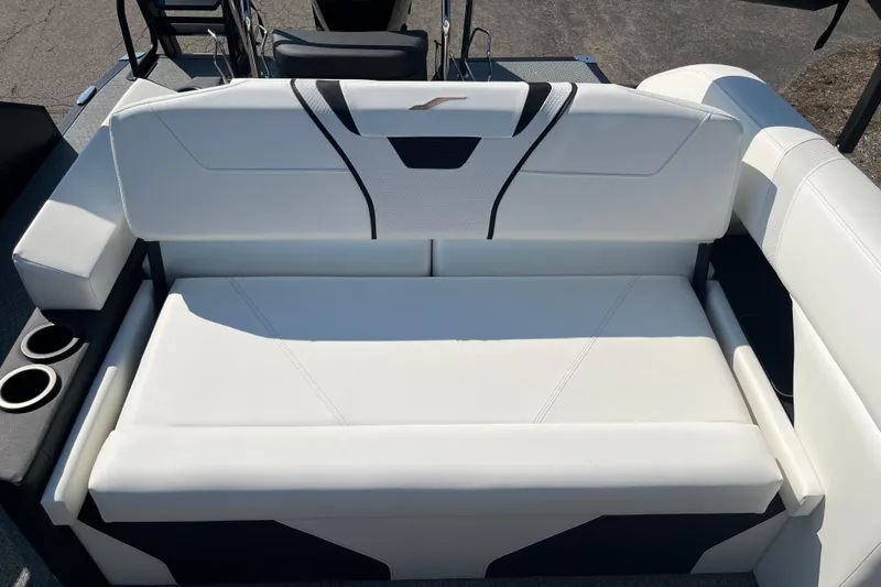 Slide: The Image of Luxurious white seating on 2026 Evotti 725CS boat, featuring cup holders and sleek design. - 4