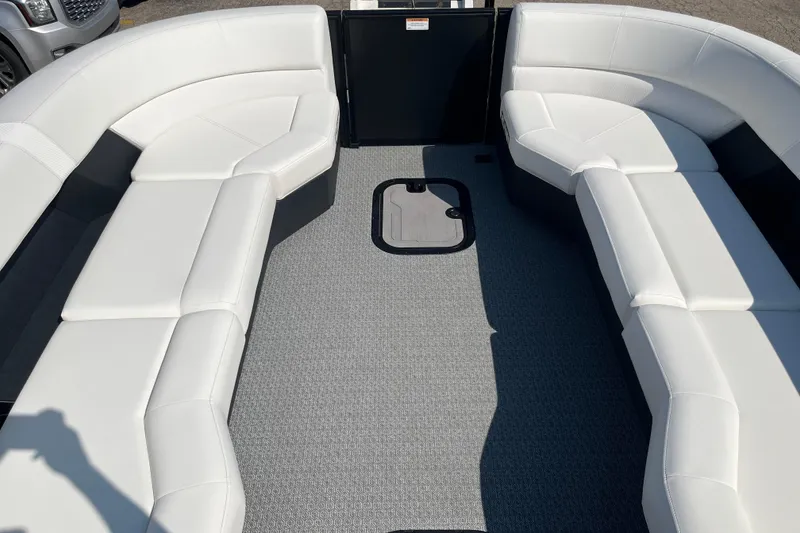 Slide: The Image of Luxurious seating on 2026 Evotti 725CS boat with white upholstery and spacious layout. - 7