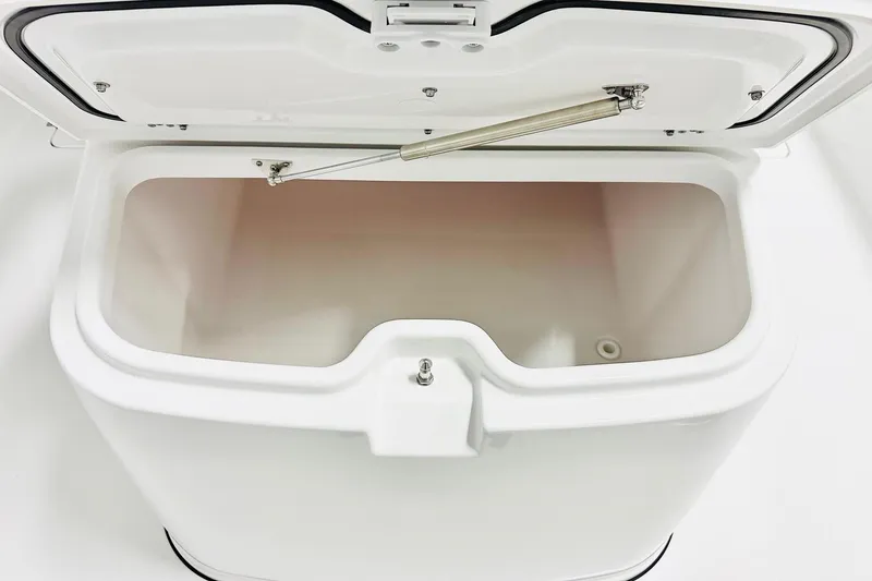 Slide: The Image of Open storage compartment on 2026 Sportsman Heritage 321 Center Console boat. - 14