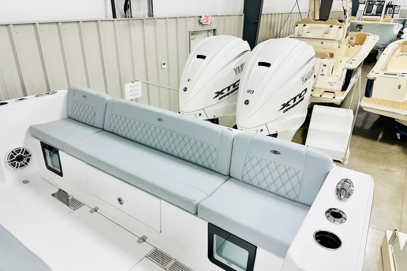 Slide: The Image of 2026 Sportsman Heritage 321 Center Console with Yamaha engines, featuring spacious seating and modern design. - 15