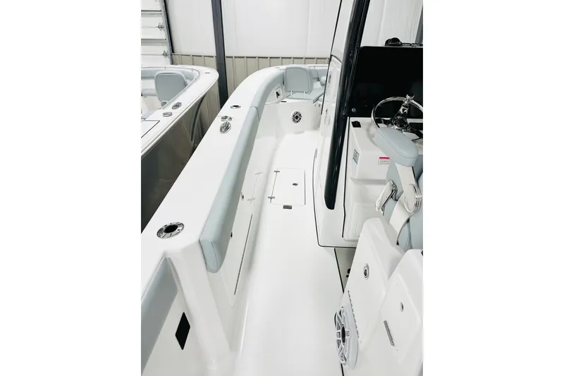 Slide: The Image of 2026 Sportsman Heritage 321 Center Console boat interior, featuring sleek design and modern amenities. - 8