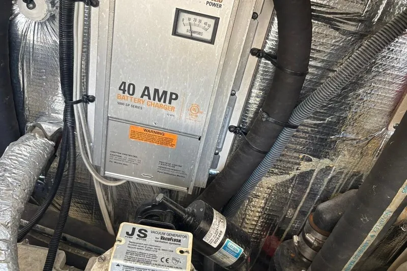 Slide: The Image of 40 AMP battery charger in 2006 Carolina Classic 32 boat engine room. - 41