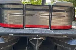 Slide: The Image of 2023 Qwest RLS 822 pontoon boat rear view with sleek design and red accents. - 7