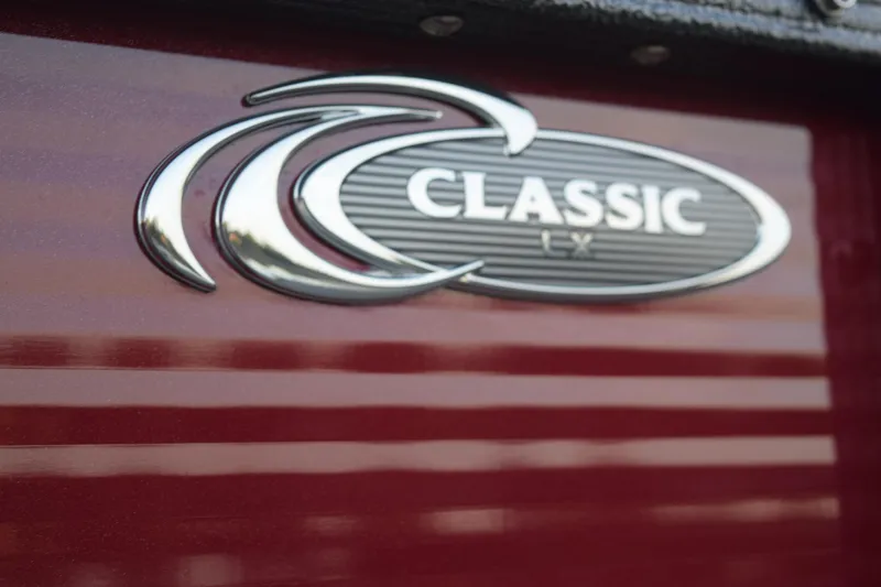 Slide: The Image of 2024 Crest Classic LX 200 L logo on a maroon background. - 17