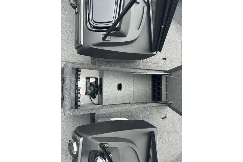 Slide: The Image of 2025 Crestliner 1750 Hawk interior storage compartments and dashboard view. - 16