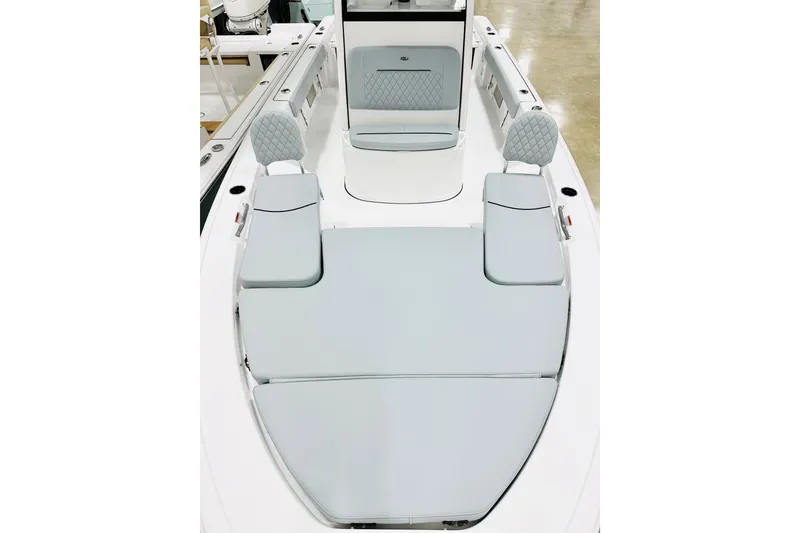 Slide: The Image of 2026 Sportsman Masters 227 Bay Boat interior with cushioned seating and sleek design. - 9