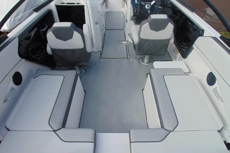 Slide: The Image of 2026 Yamaha Boats AR250 interior with modern seating and sleek design. - 17