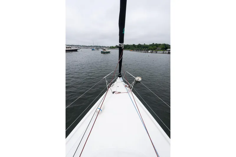 Slide: The Image of Bow view of 2026 J Boats J/40 sailboat on calm water. - 20