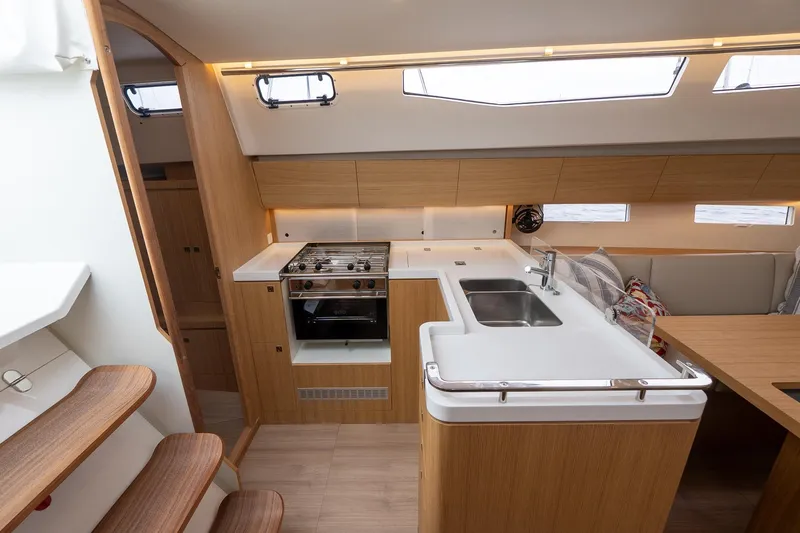 Slide: The Image of Modern 2026 J Boats J/40 yacht interior with sleek kitchen and dining area. - 27