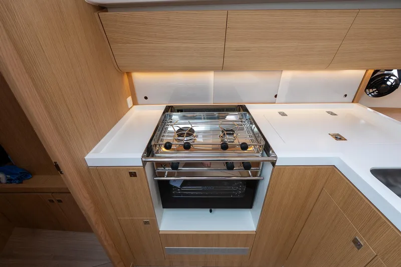 Slide: The Image of Modern galley kitchen in 2026 J Boats J/40 yacht with stove and sleek cabinetry. - 28