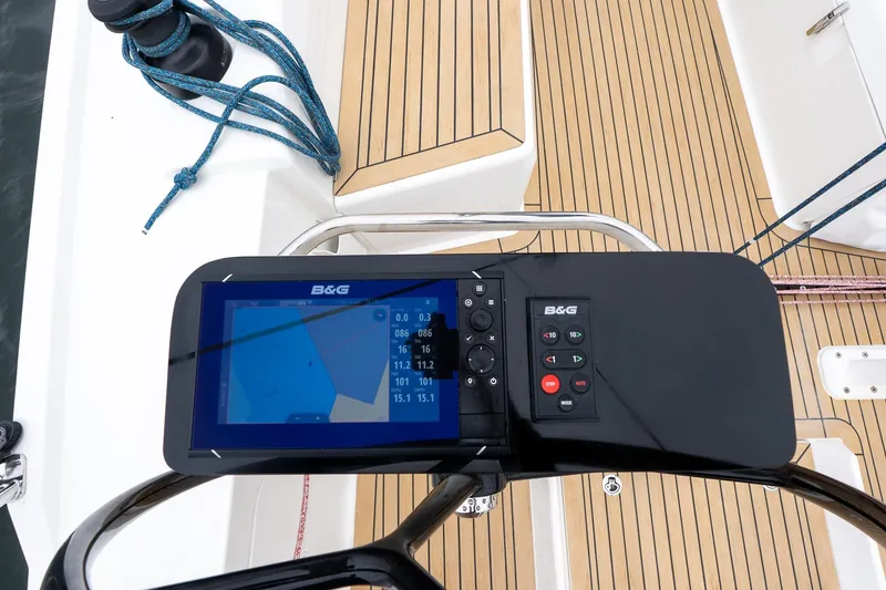 Slide: The Image of B&G navigation system on 2026 J Boats J/40 yacht, featuring sleek teak decking. - 6